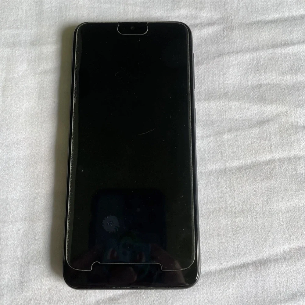 Samsung Smartphone with Black Display Samsung Galaxy A10e locked to track phone